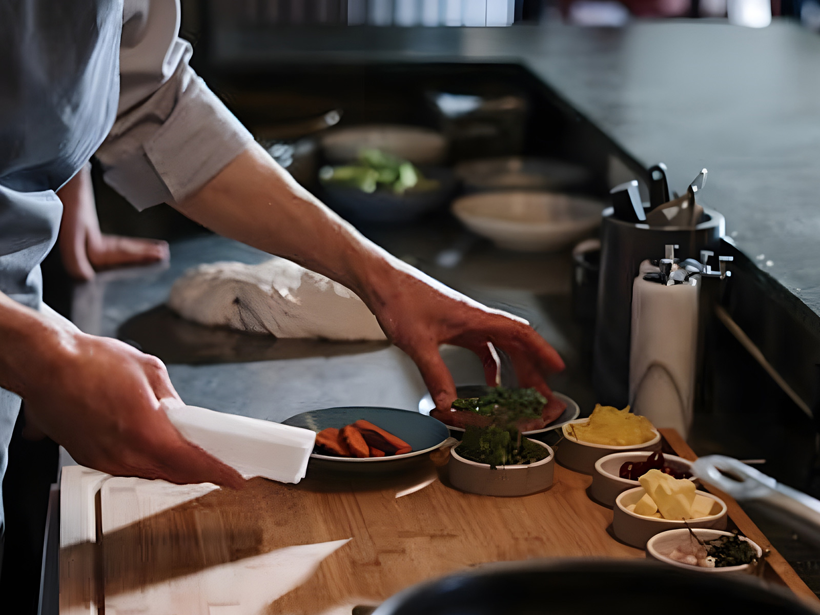 Kitchen staff preparing food during service after first Snibbl listing