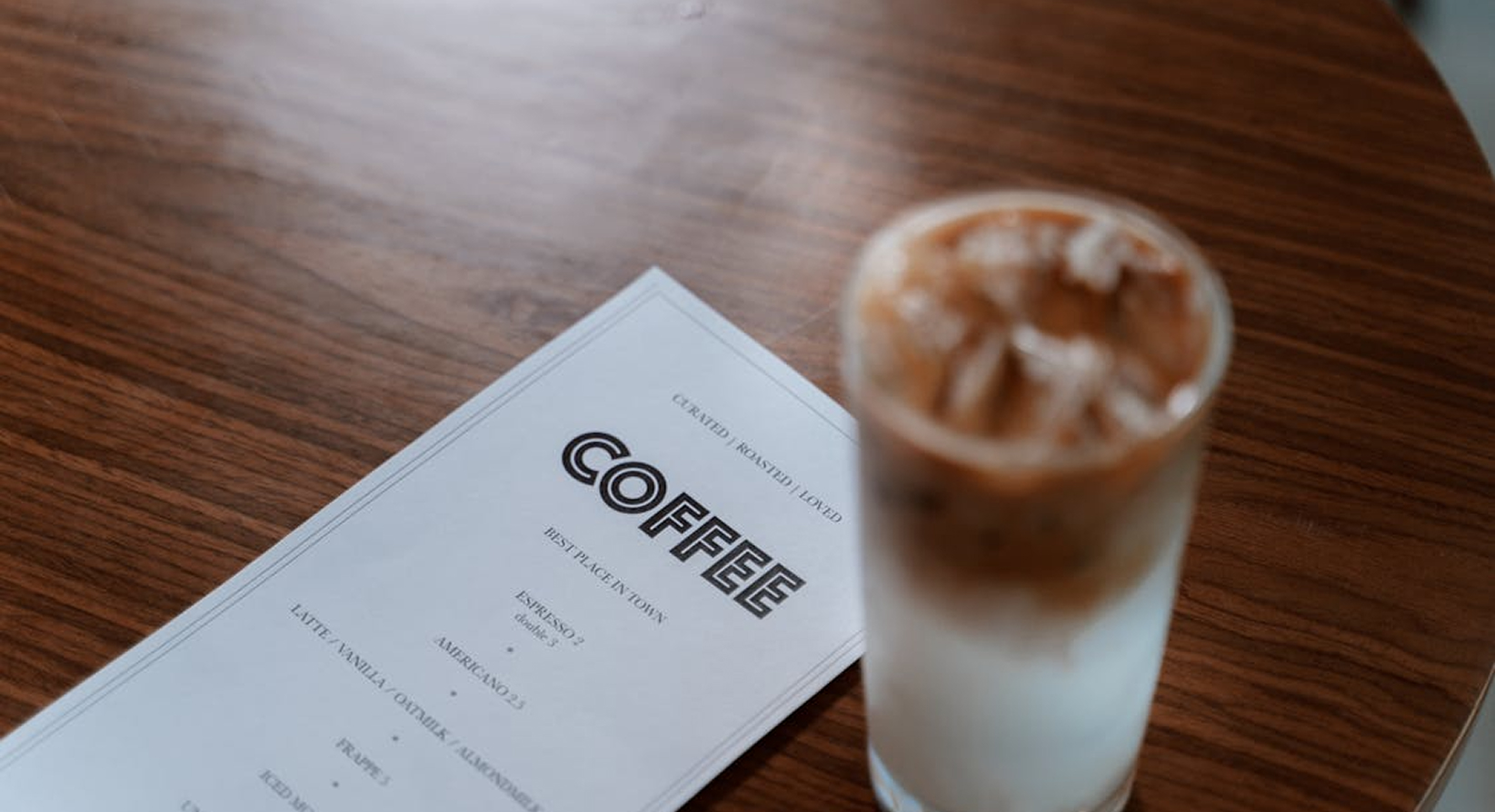 Restaurant menu and table setting showing how forecasting and menu planning affect food surplus