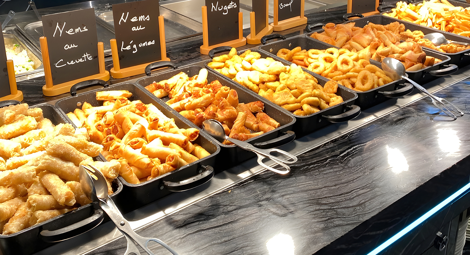 Meals waiting to be served in a restaurant kitchen